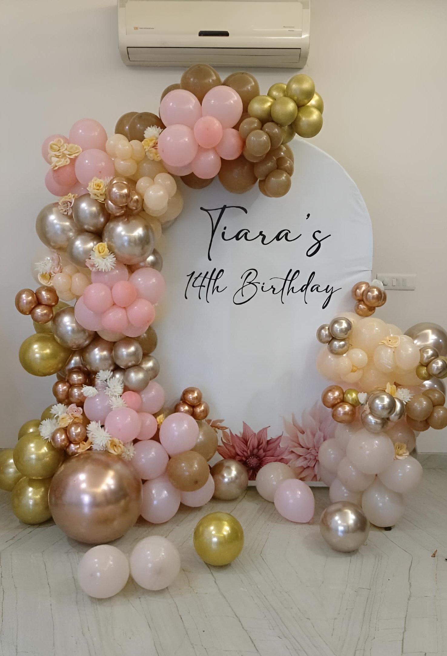 Decoration with beautiful pastel pink, rose gold, golden and white balloon decoration, customized round backdrop, floral accents and personalized name & age. Perfect for Girl Birthday Party, First Birthday Decoration, Kids Birthday Decoration, Adult Birthday Decoration, Home Birthday Party and Balloon Decoration. We provide birthday decoration near me and professional balloon decoration services in Rajouri Garden and nearby areas, including Tagore Garden, Subhash Nagar, Hari Nagar, Janakpuri, Tilak Nagar, Ashok Nagar, Kirti Nagar, Moti Nagar, Ramesh Nagar, Punjabi Bagh, Paschim Vihar, Shadipur, Patel Nagar, Naraina, Mayapuri, Vikaspuri, Uttam Nagar and West Delhi.